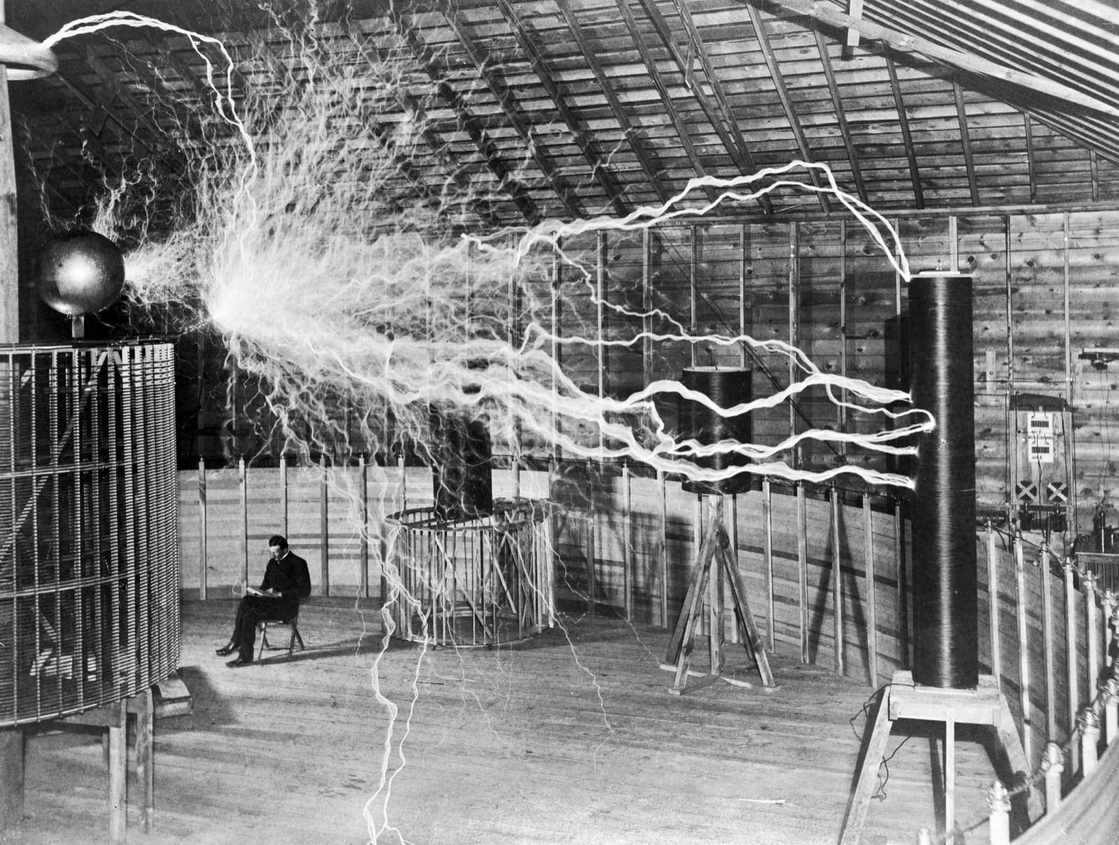 Nikola Tesla with his alternating-current equipment